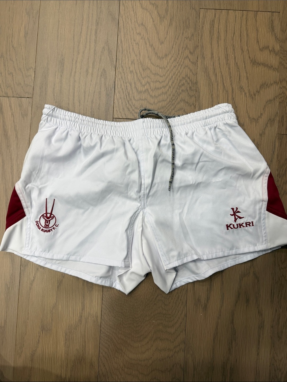 Kid’s White Athletic Rugby Shorts with Maroon Accents